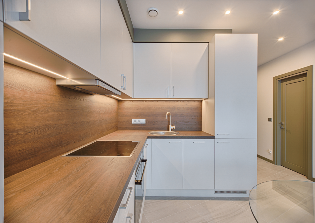 Seamlessly integrated built-in appliances in a modular kitchen in Greater Noida