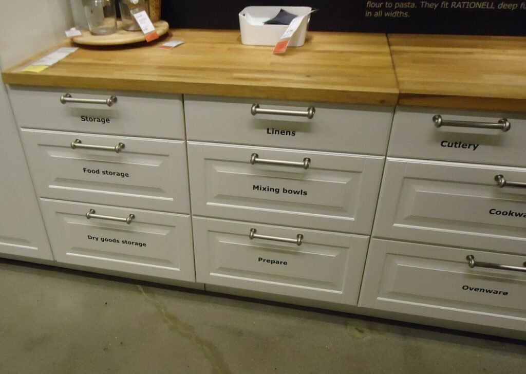 Modular kitchen drawer units on display in a retail showroom